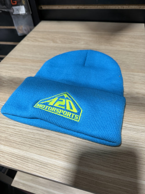 A2D Motorsports cuffed knit beanie in teal with neon yellow embroidered mountain logo
