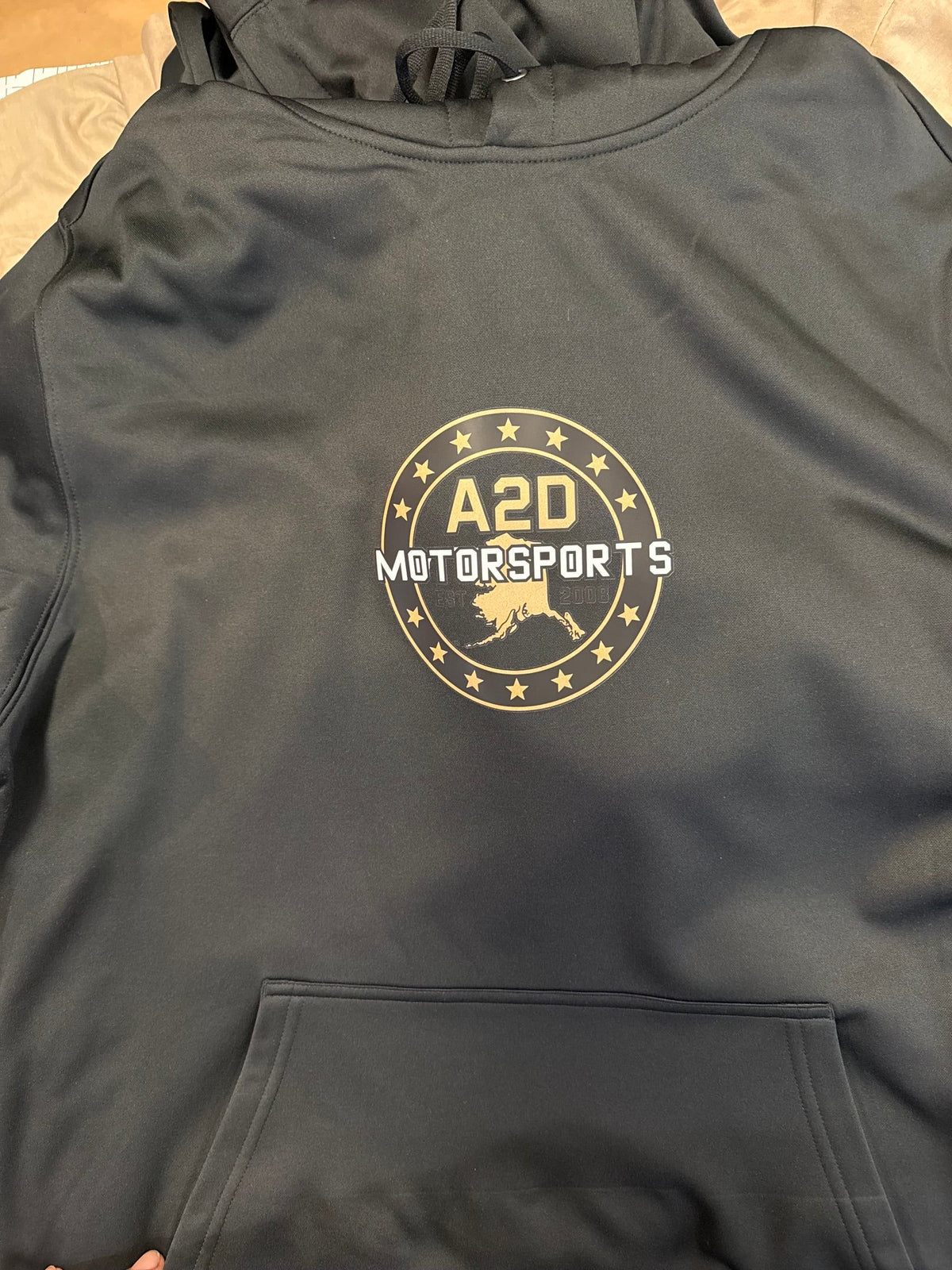 A2D Motorsports black hoodie with gold Stars and State Alaska logo