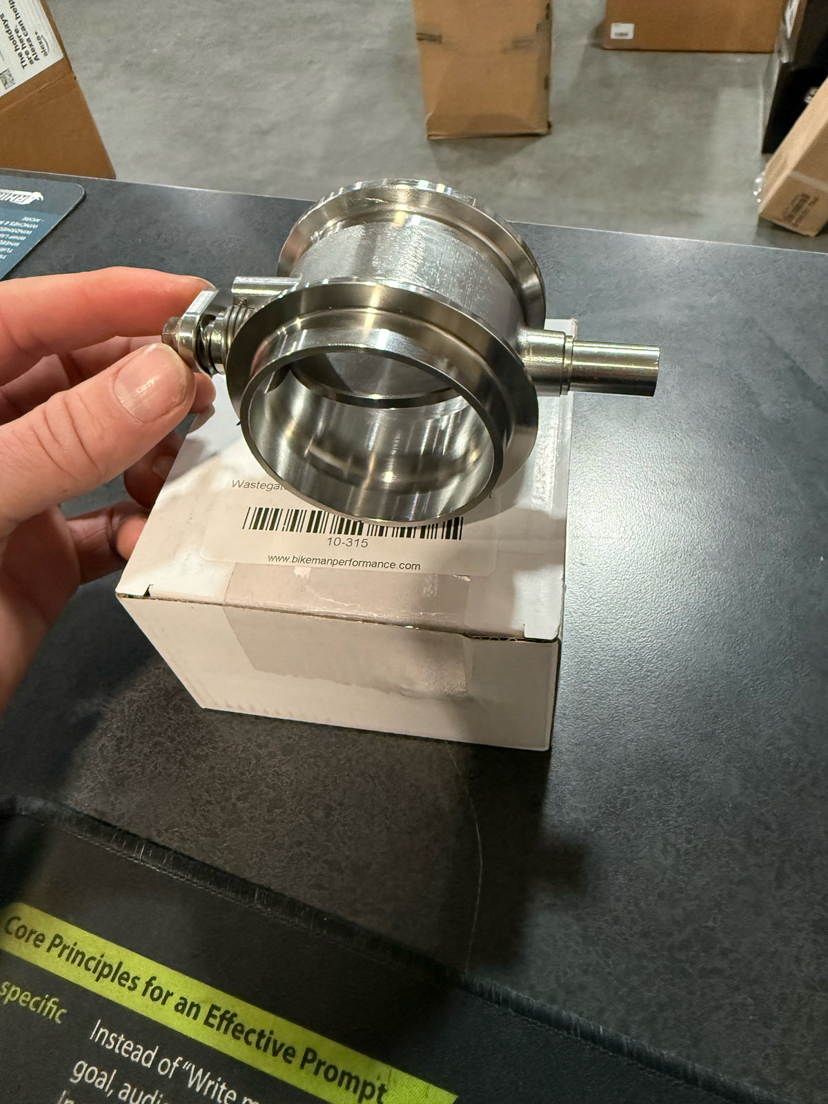 Bikeman 10-315 wastegate actuator in hand at A2D, view 3