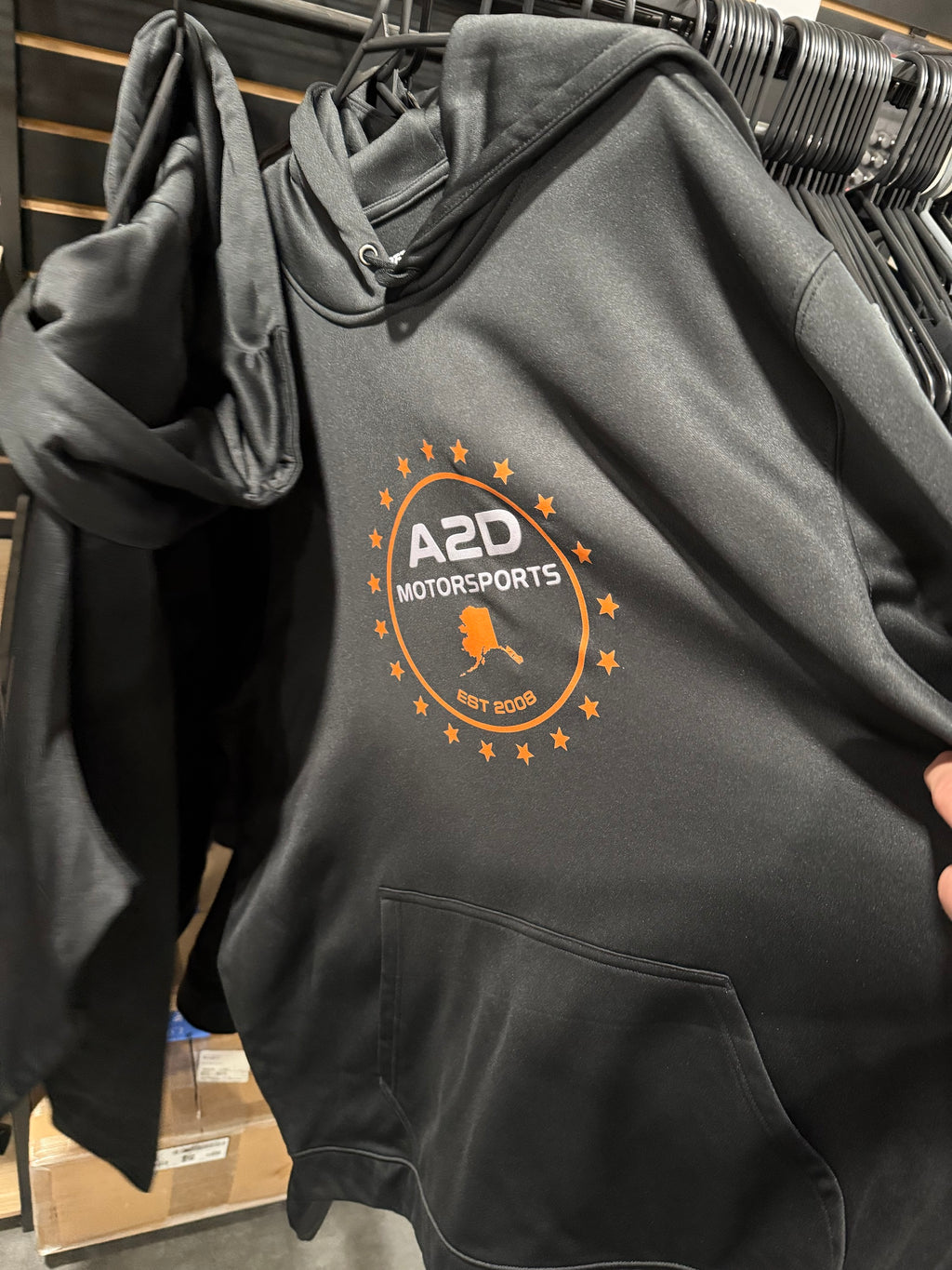 A2D Motorsports black hoodie with orange Stars and State Alaska logo