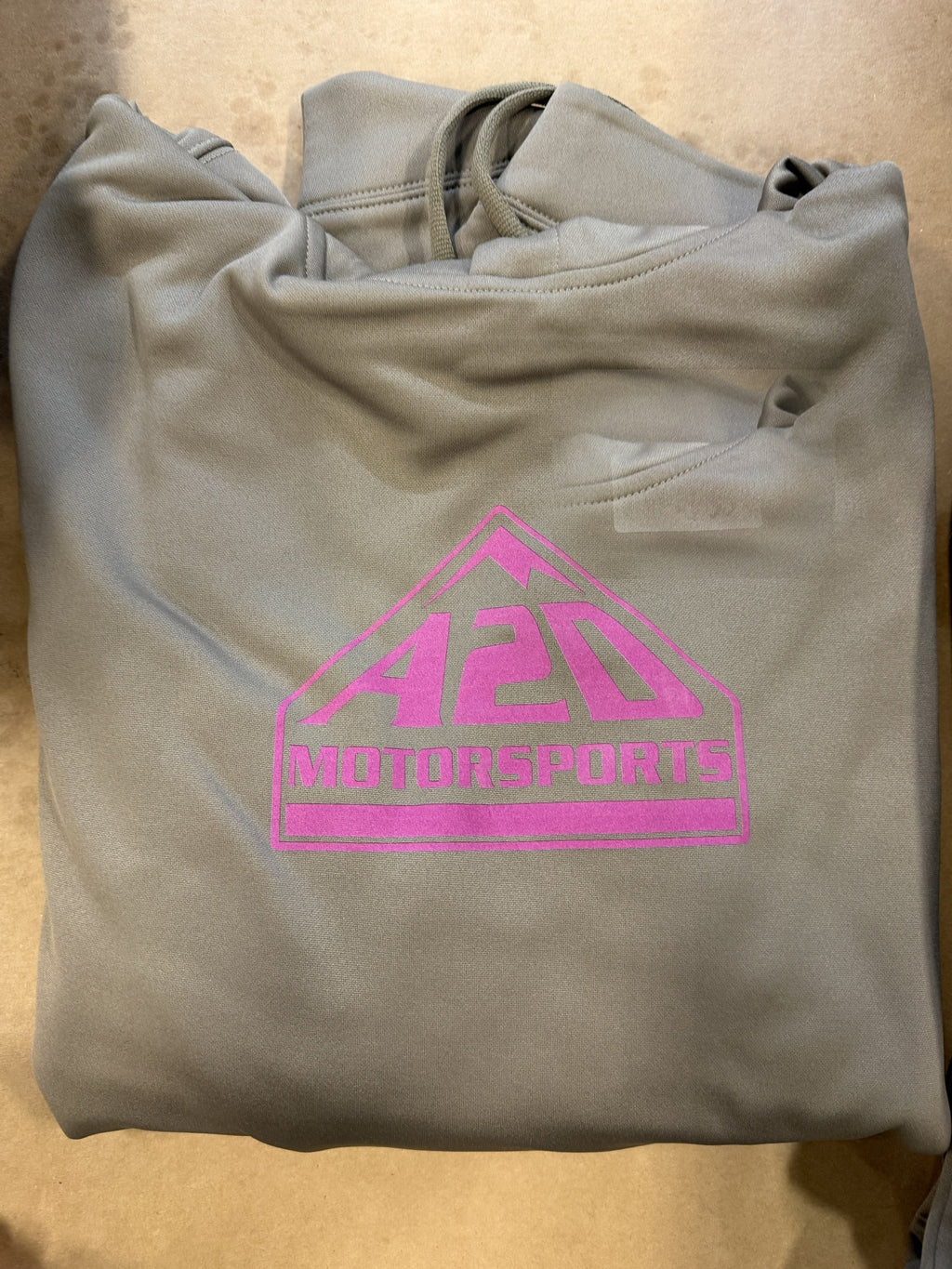 A2D Motorsports sand hoodie with the pink mountain logo